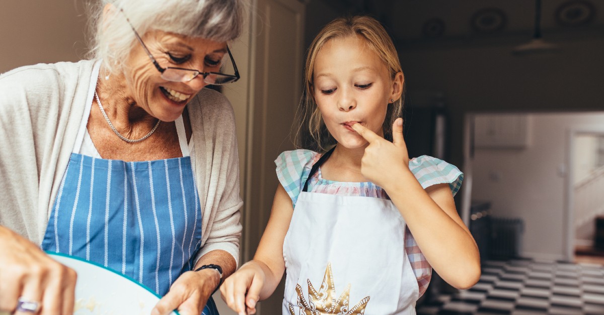 grandmother and granddaughter baking